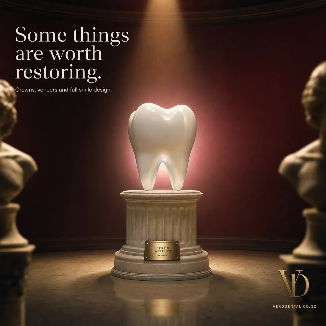 Concept advertisement for Vero Dental, an invented clinic. Maroon gallery set: marble bust, fluted plinth, brass plaque.