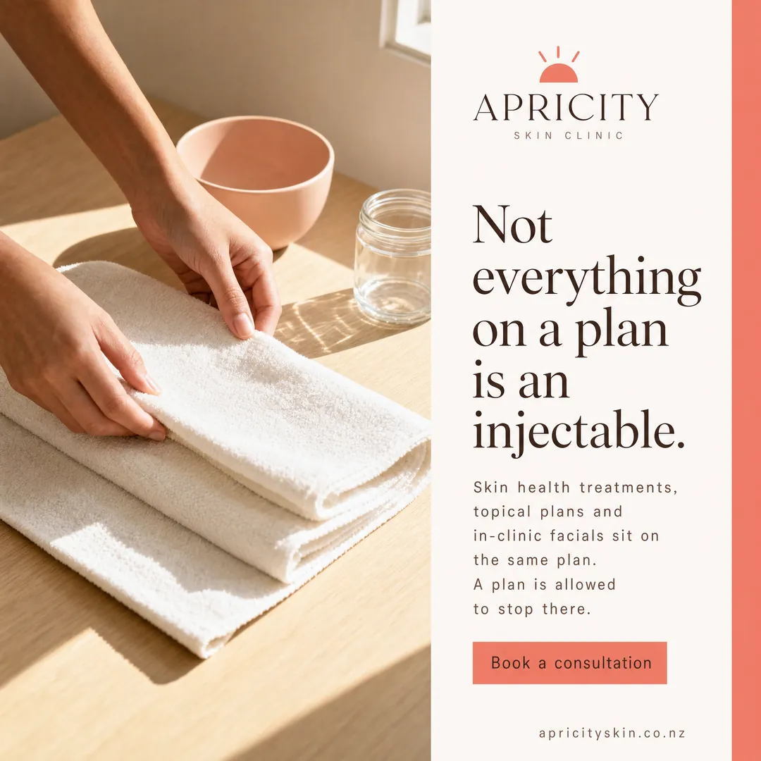 Concept advertisement for Apricity Skin Clinic, an invented clinic. Oak desk in low sun, eucalyptus laid across the leaf shadow.